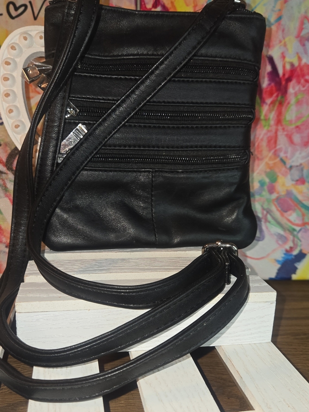 Black Leather Crossbody Bag with Multiple Zip Pockets